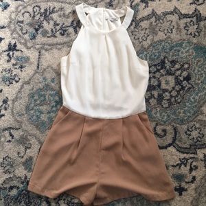 Romper white and tan. Great condition like new!